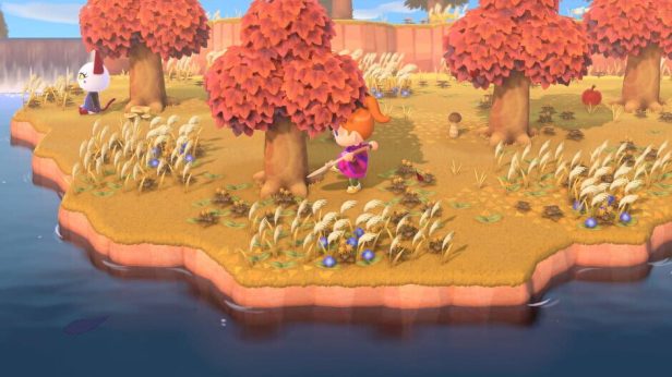 Digging up a tree in Animal Crossing New Horizons.